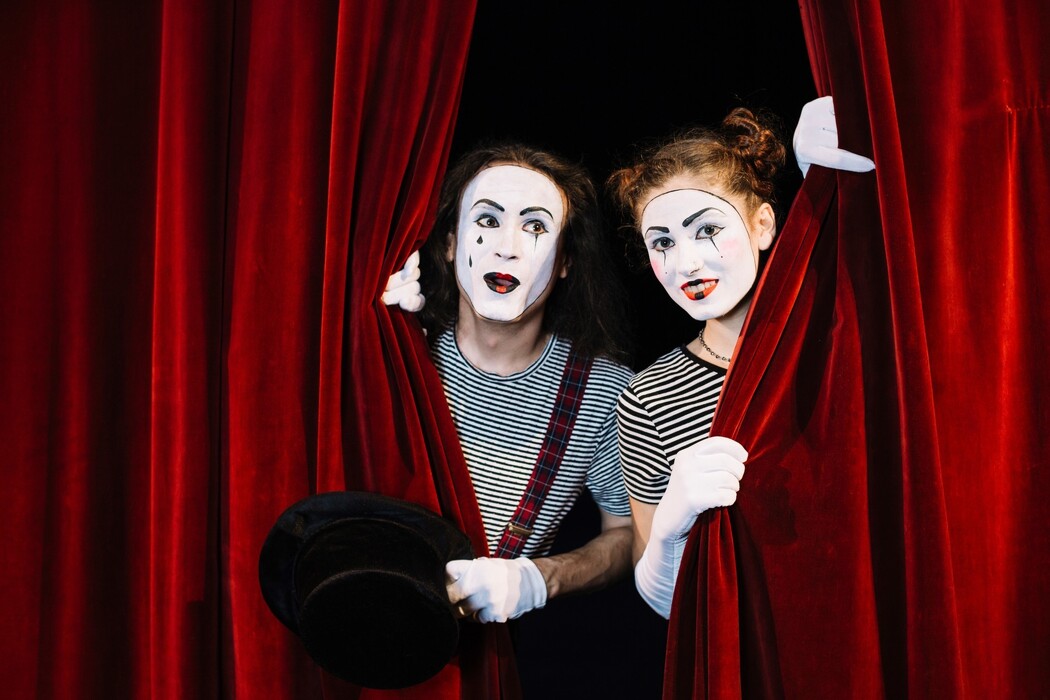 zaig6paxib_____two-mime-artist-peeking-through-red-curtain (1)